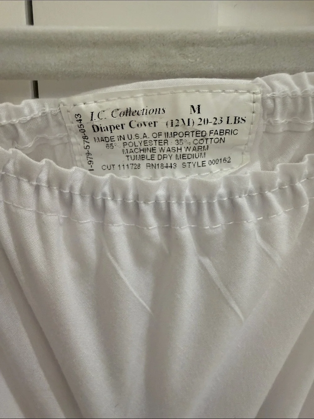 Pair of IC COLLECTIONS White Ruffle Diaper Covers w/ “C” Floral Monograms